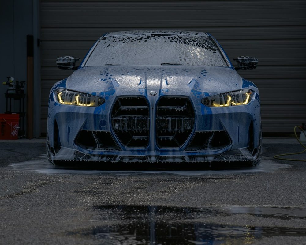 Car covered in foam during an exterior wash